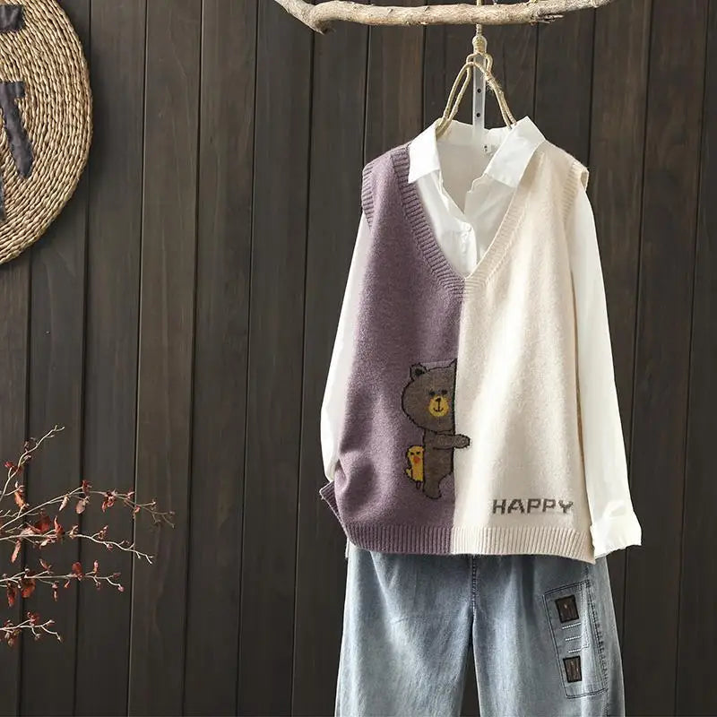 Spring and autumn new simple color matching knitted vest women loose wild V-neck cartoon pattern knitted sweater