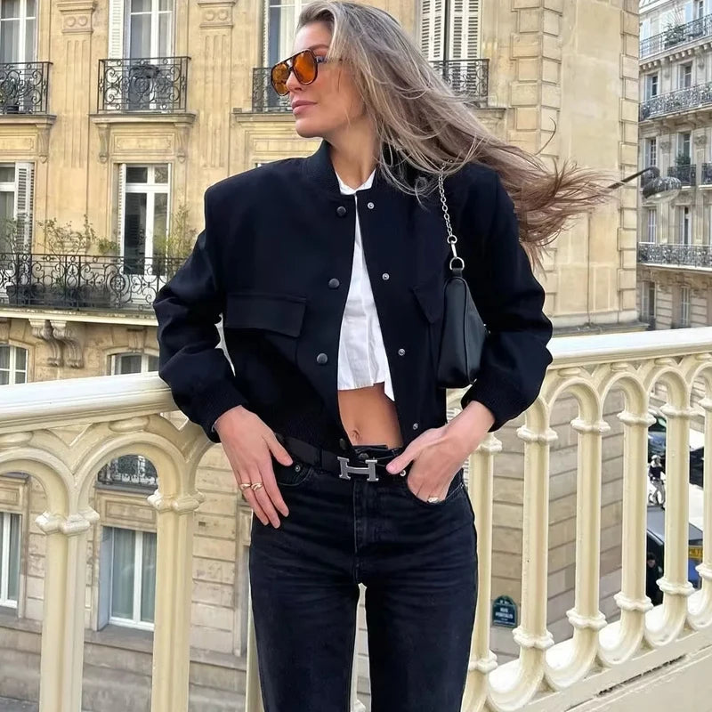 Stylish white bomber jacket for women with buttons, long sleeves, and a cropped design. Perfect for autumn and winter.