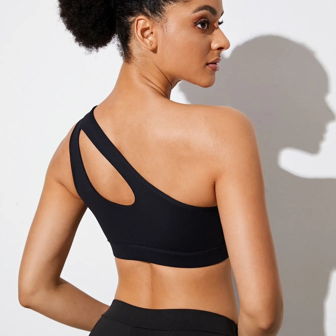 One-Shoulder Push-Up Sports Bra, Shockproof, for Yoga and Fitness. Black and White