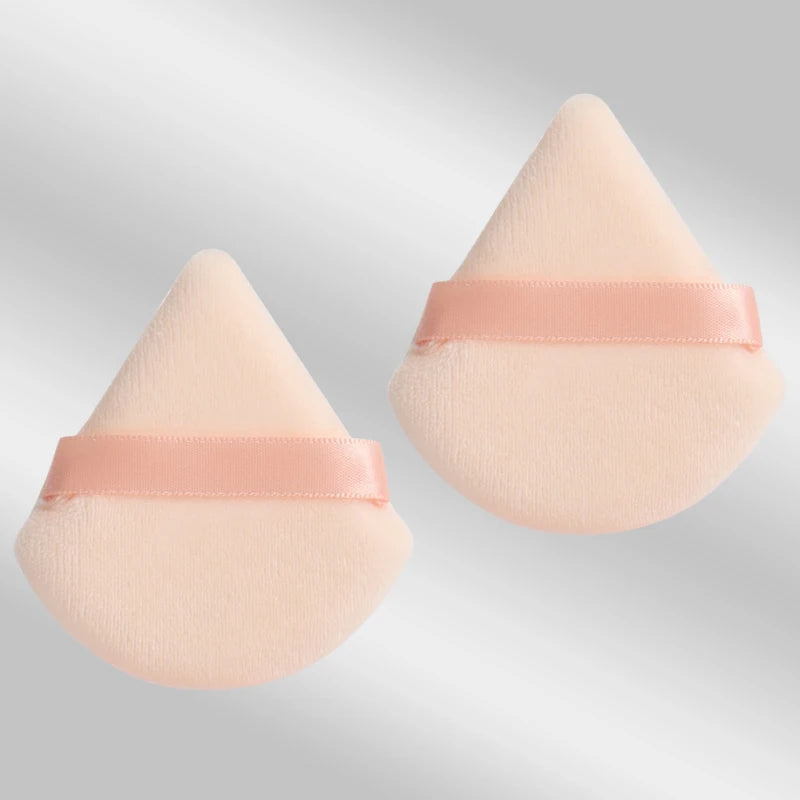 2 velvet triangle puffs for foundation and blending