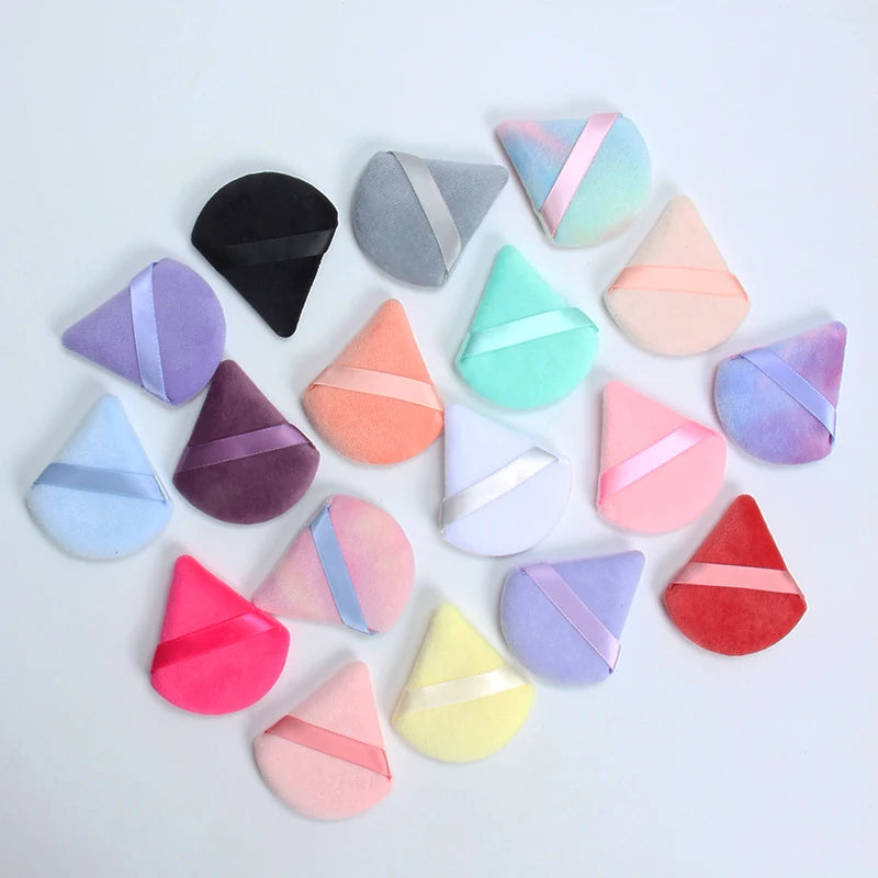 2 velvet triangle puffs for foundation and blending