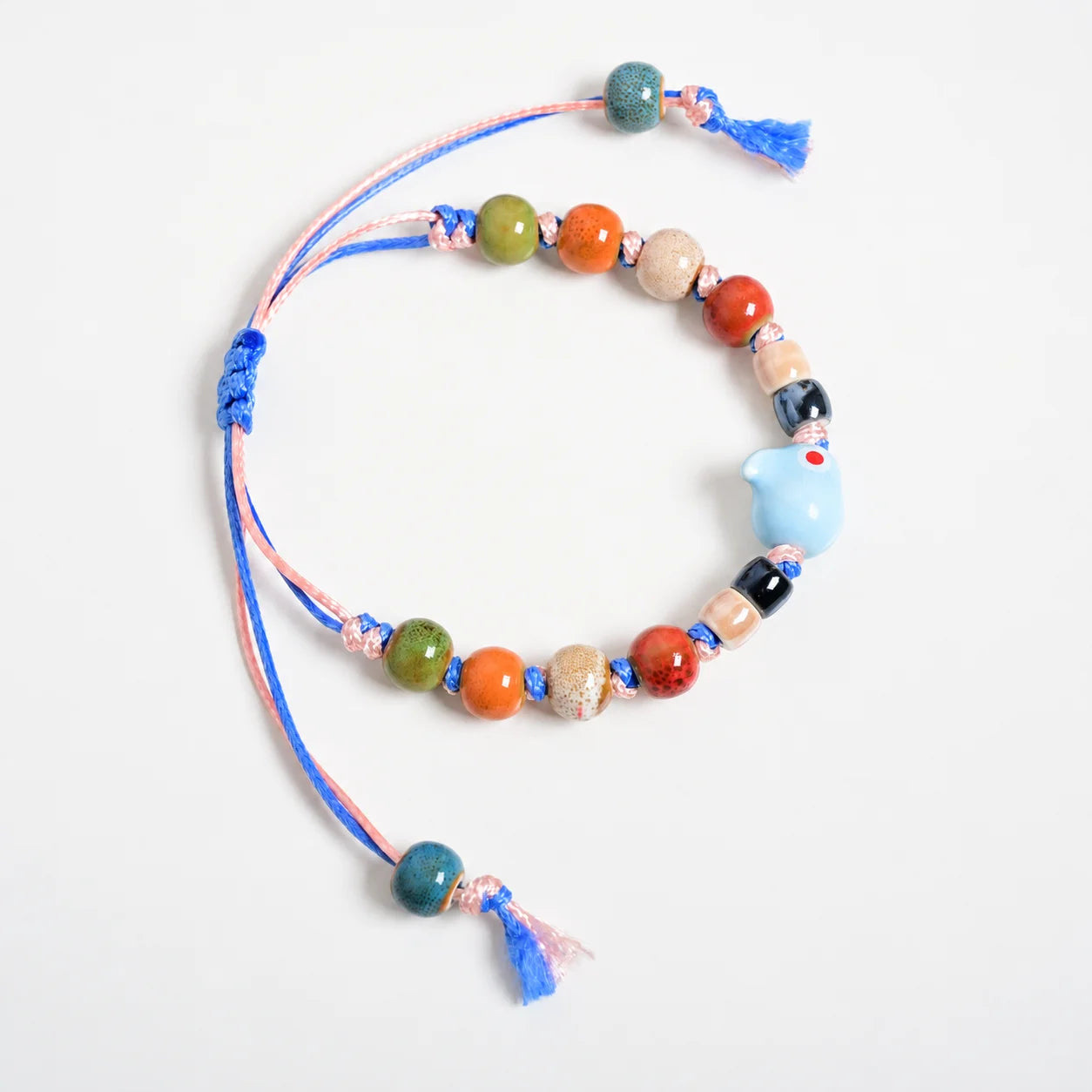 Handmade Blue Rabbit Ceramic Bracelet – Adjustable Woven Wax Cord Bunny Charm Jewelry