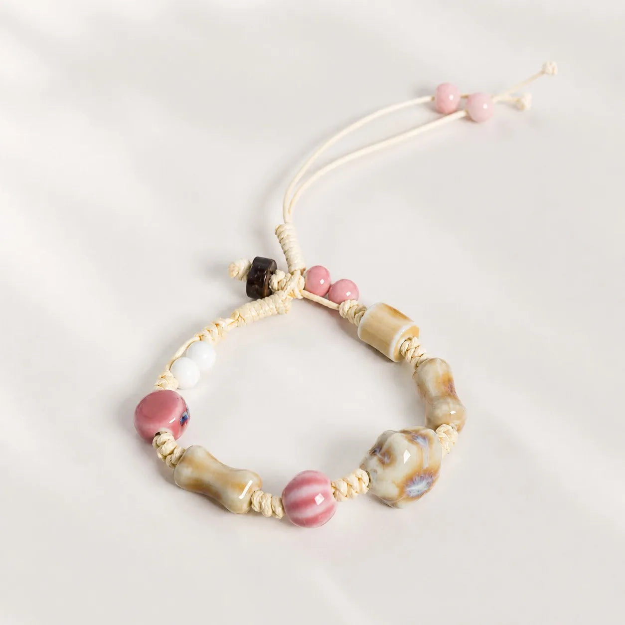 Handmade Ceramic Bone Bead & Star Charm Bracelet – Adjustable Wax Cord Artisan Jewelry