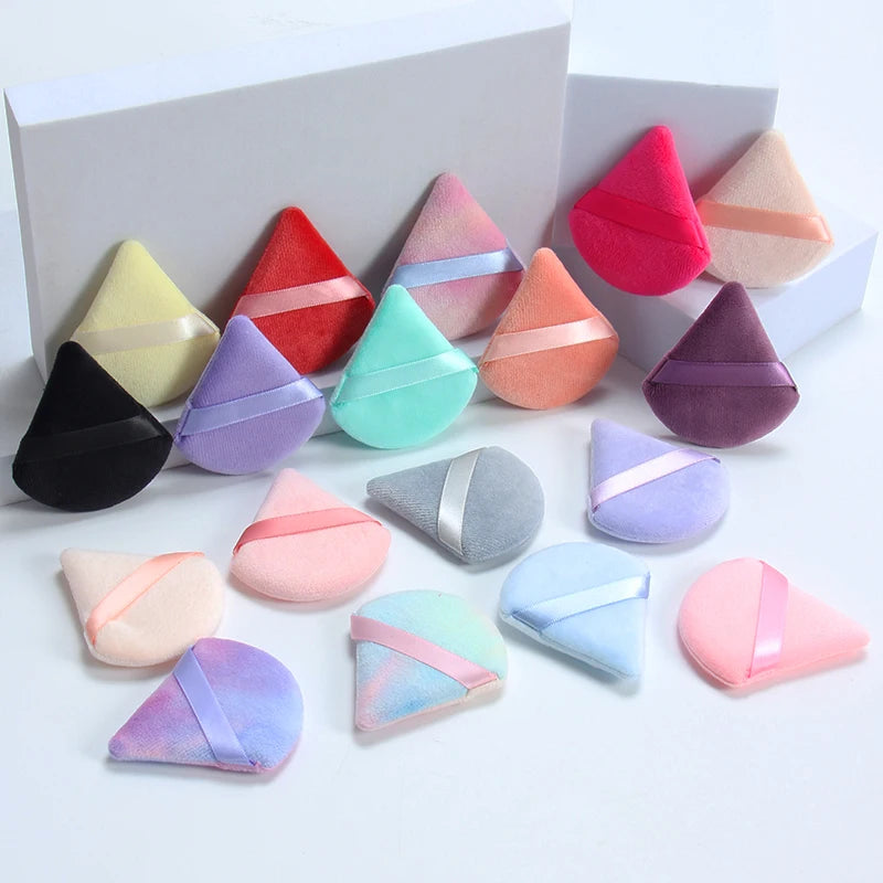 2 velvet triangle puffs for foundation and blending