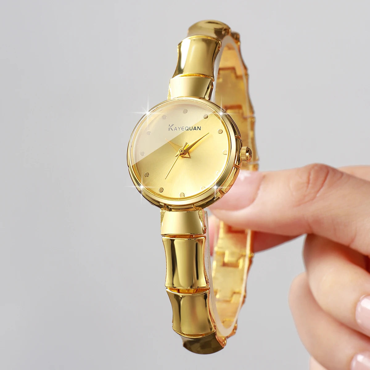 Elegant Women's Gold Bamboo Bracelet Quartz Watch – Luxury Dress Wristwatch