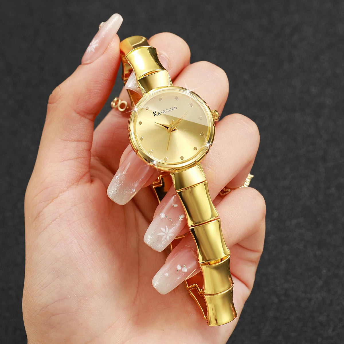 Elegant Women's Gold Bamboo Bracelet Quartz Watch – Luxury Dress Wristwatch