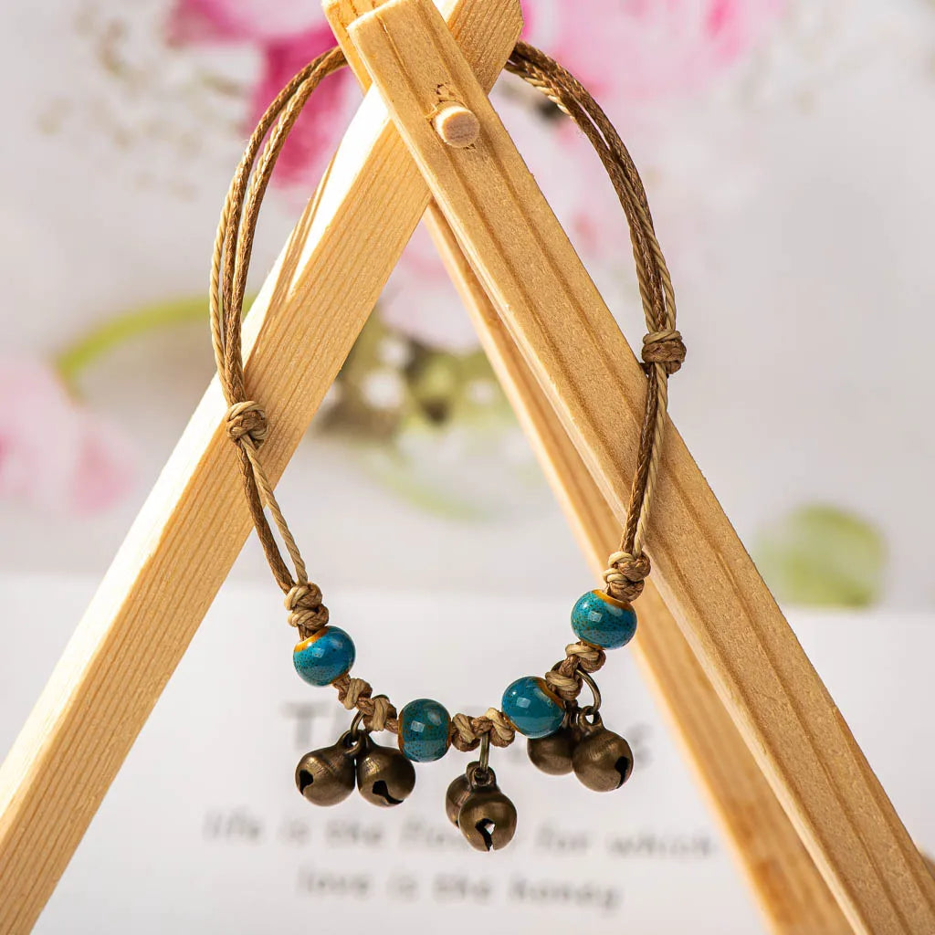 Handmade Ceramic Bead Bracelet with Small Bell – Adjustable Artisan Jewelry Gift