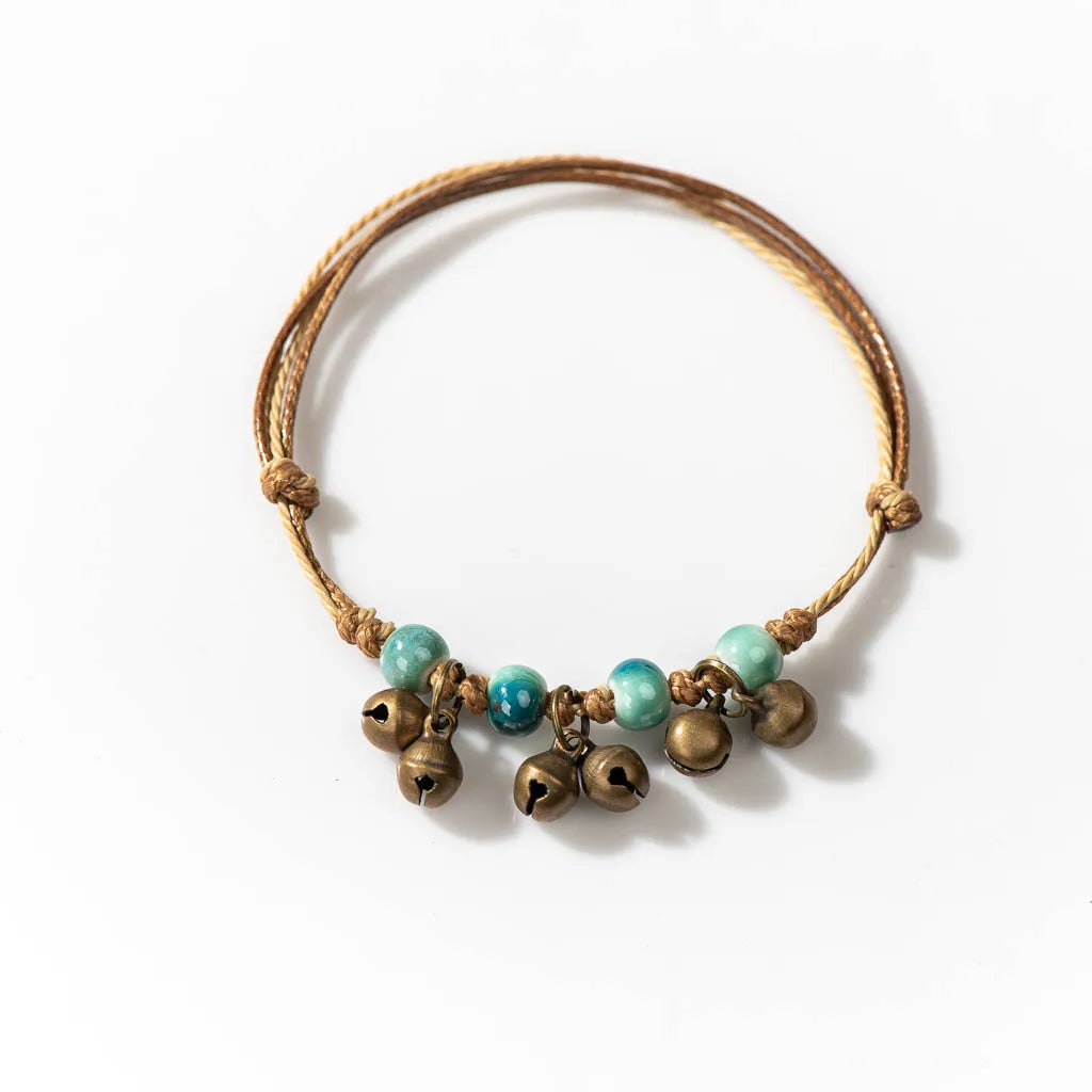 Handmade Ceramic Bead Bracelet with Small Bell – Adjustable Artisan Jewelry Gift