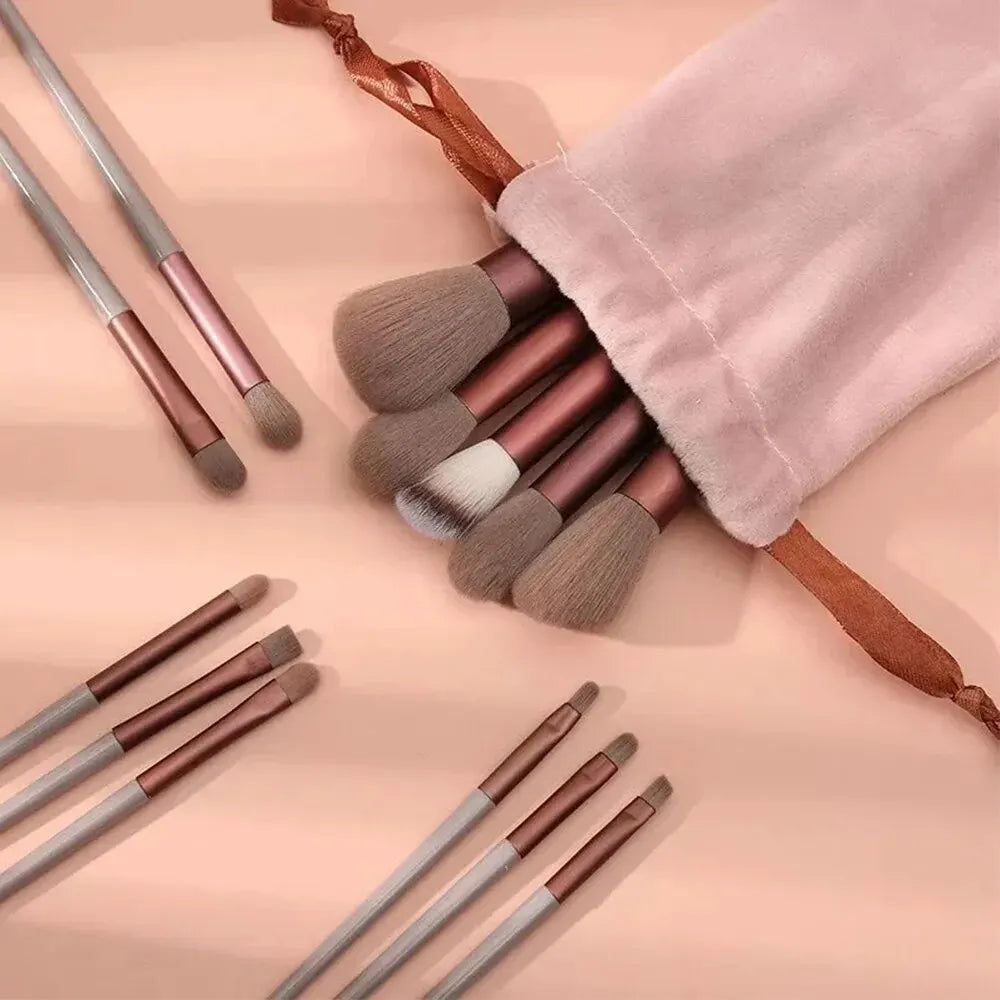 13-piece makeup brush set with soft bristles for eyeshadow, foundation, and blush. Includes a handy carrying bag