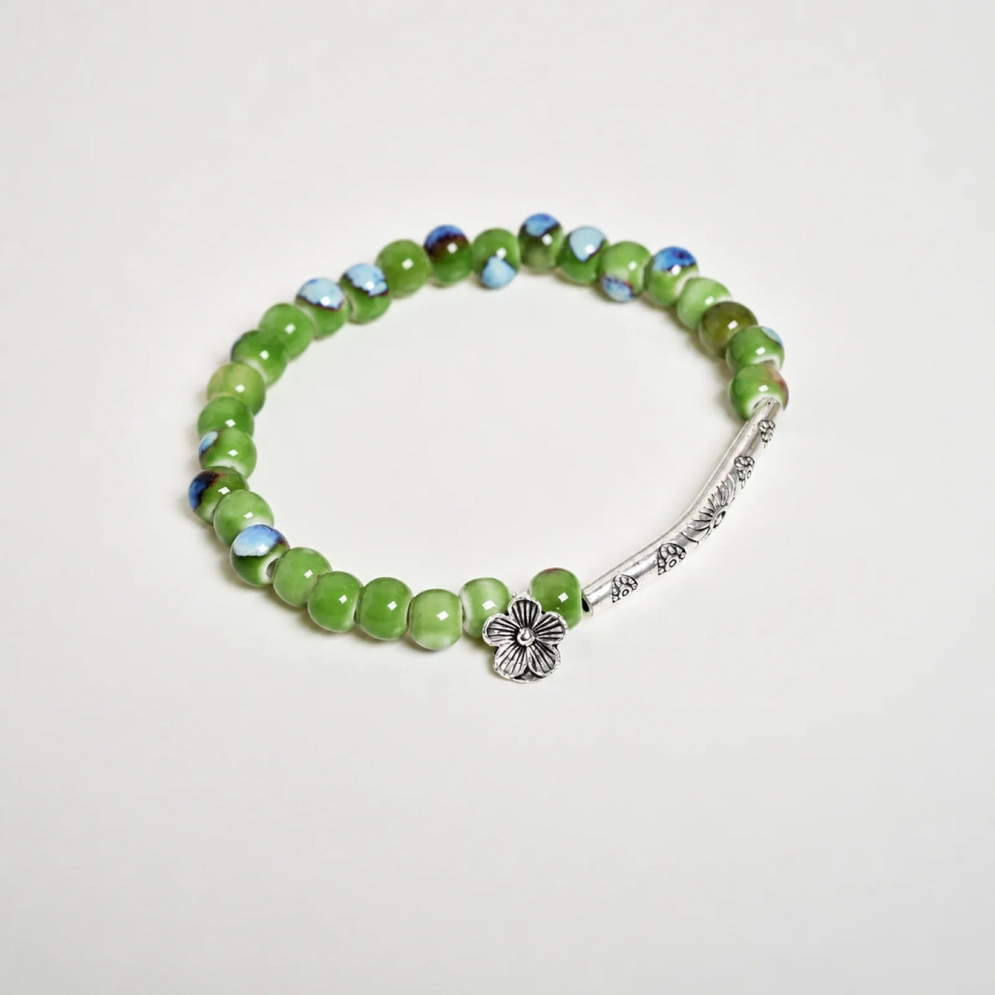 Handmade Green Ceramic Flower Bead Bracelet – Braided Elastic Cord Artisan Jewelry