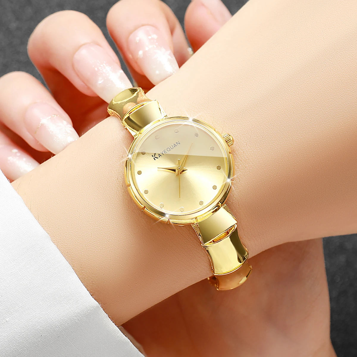 Elegant Women's Gold Bamboo Bracelet Quartz Watch – Luxury Dress Wristwatch