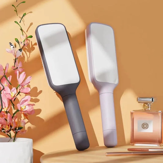 Massage Airbag Comb: Anti-static, self-cleaning hairbrush with rotating handles. Perfect for women!