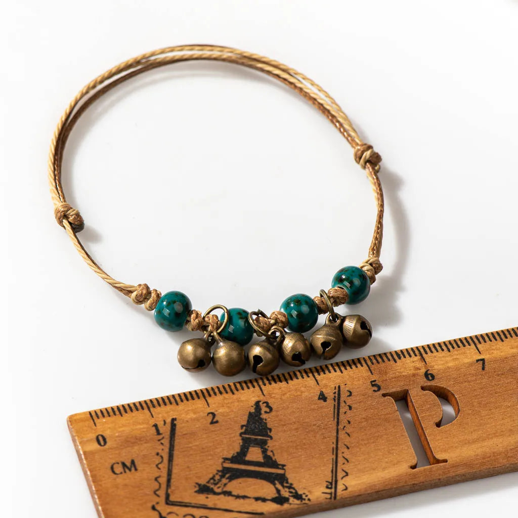Handmade Ceramic Bead Bracelet with Small Bell – Adjustable Artisan Jewelry Gift