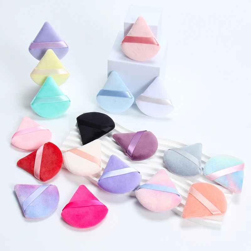 2 velvet triangle puffs for foundation and blending