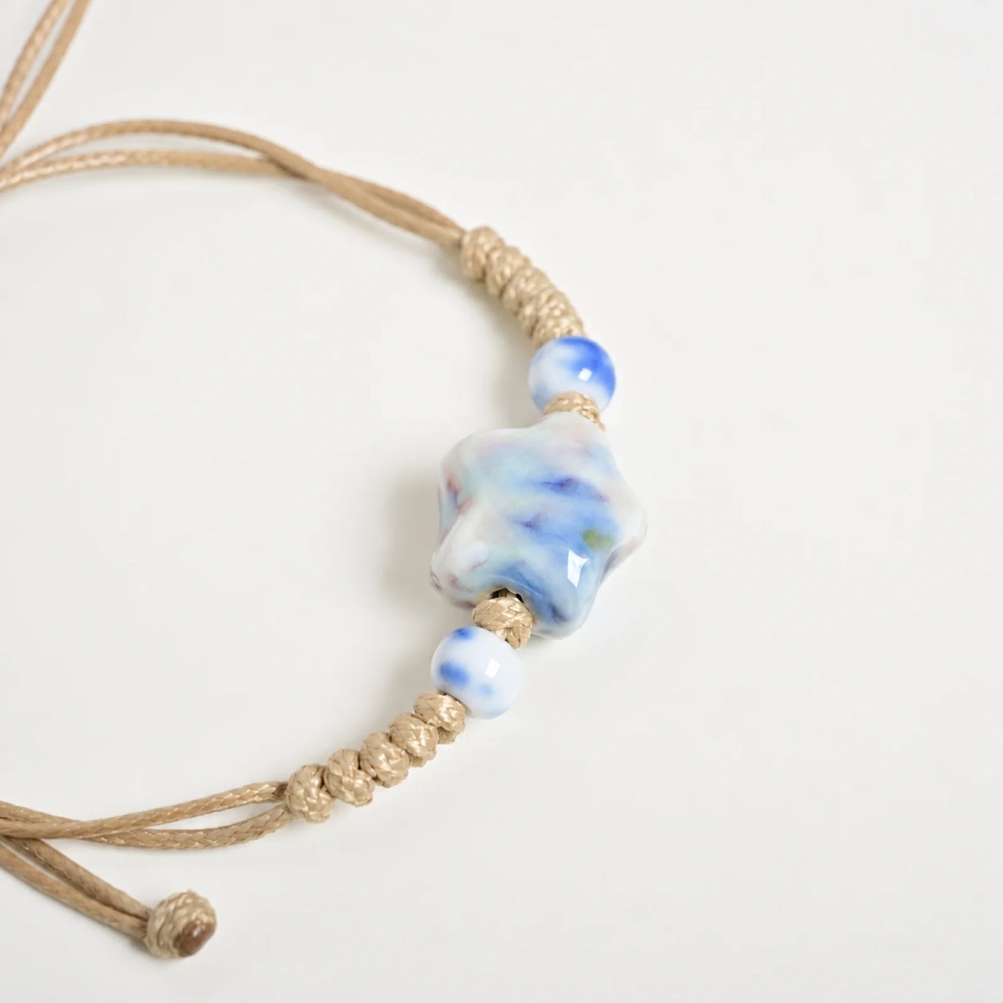 Handmade Blue & Green Star Ceramic Bead Bracelet – Adjustable Woven Wax Cord Artisan Jewelry