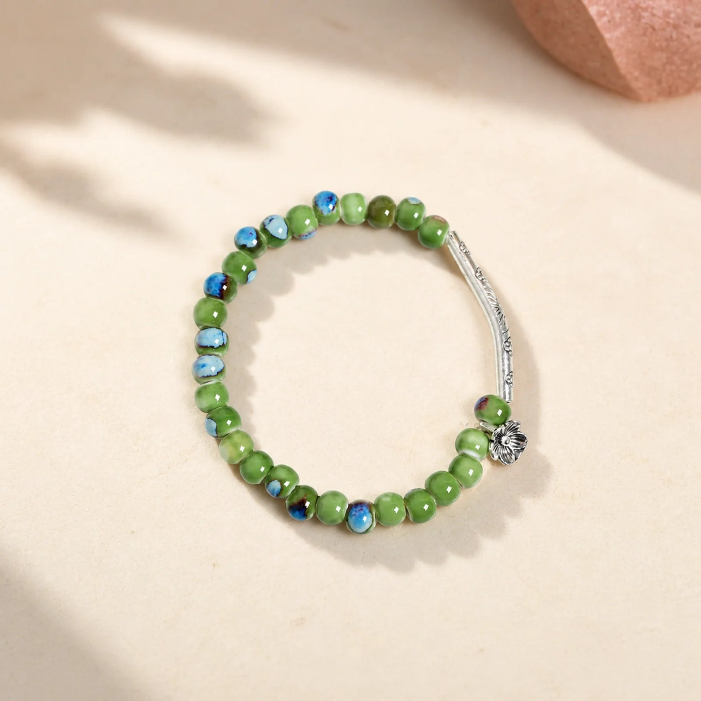 Handmade Green Ceramic Flower Bead Bracelet – Braided Elastic Cord Artisan Jewelry