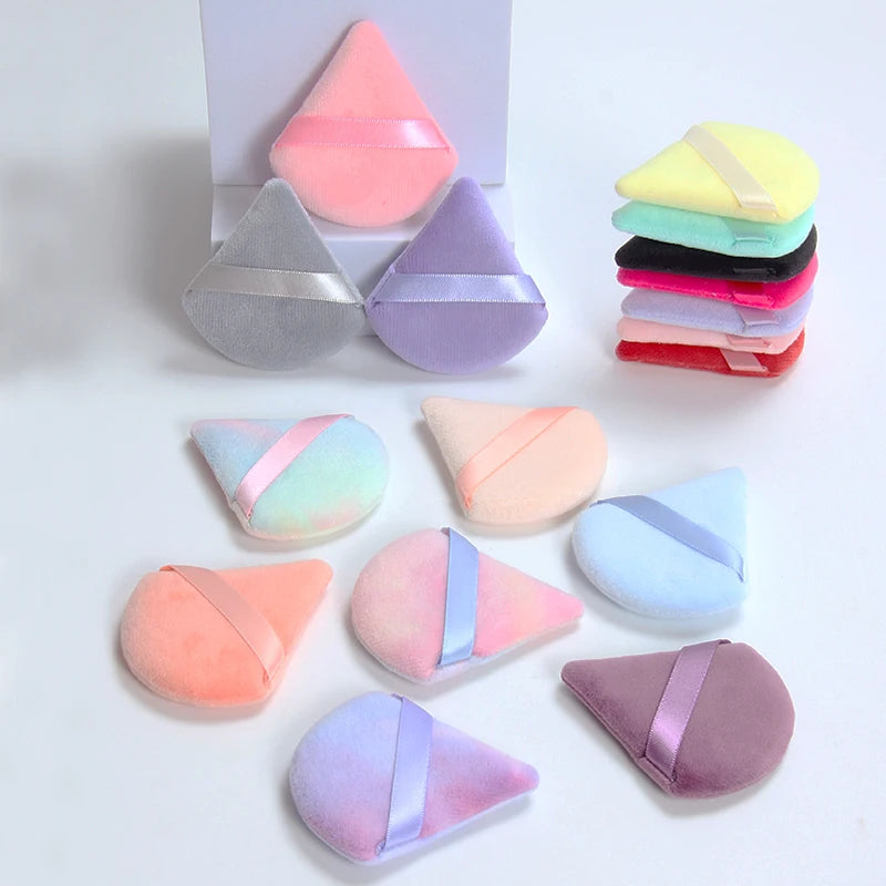 2 velvet triangle puffs for foundation and blending