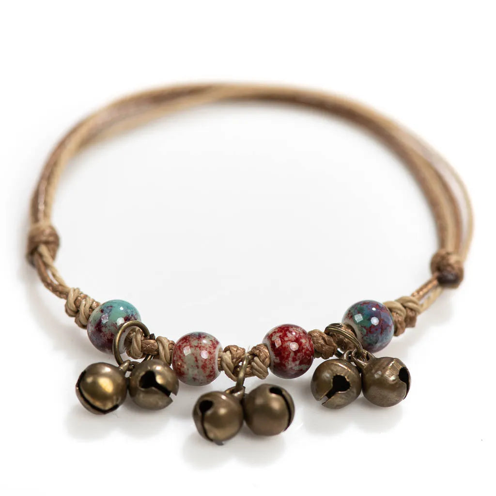 Handmade Ceramic Bead Bracelet with Small Bell – Adjustable Artisan Jewelry Gift