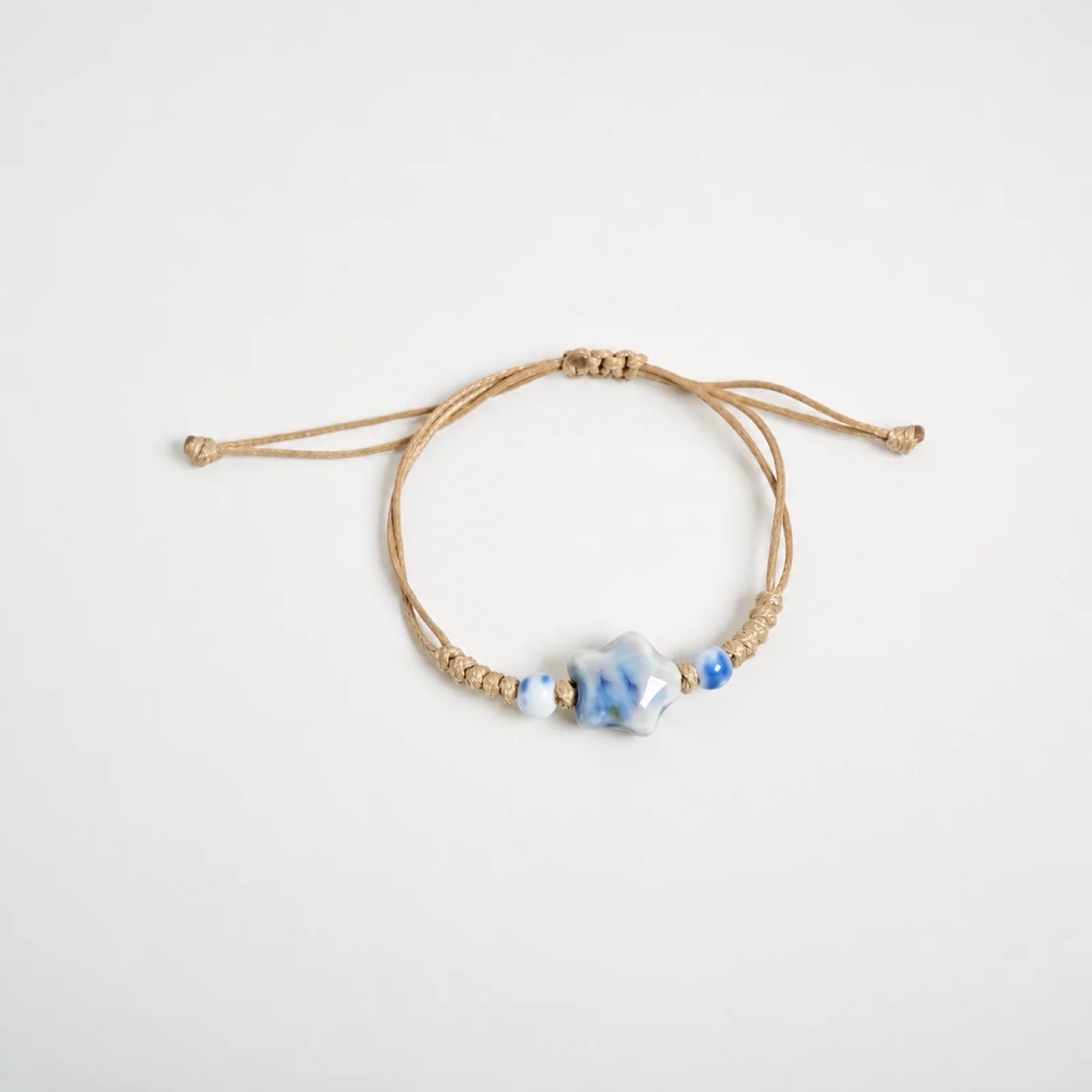 Handmade Blue & Green Star Ceramic Bead Bracelet – Adjustable Woven Wax Cord Artisan Jewelry