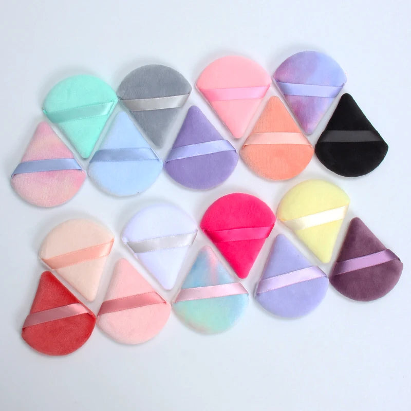 2 velvet triangle puffs for foundation and blending